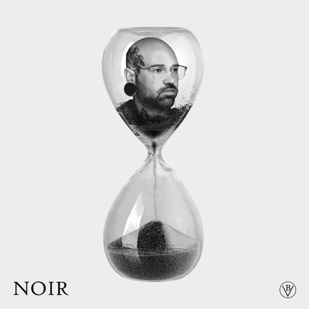 Noir album cover: a bald man's portrait inside an hourglass, black sand running through
